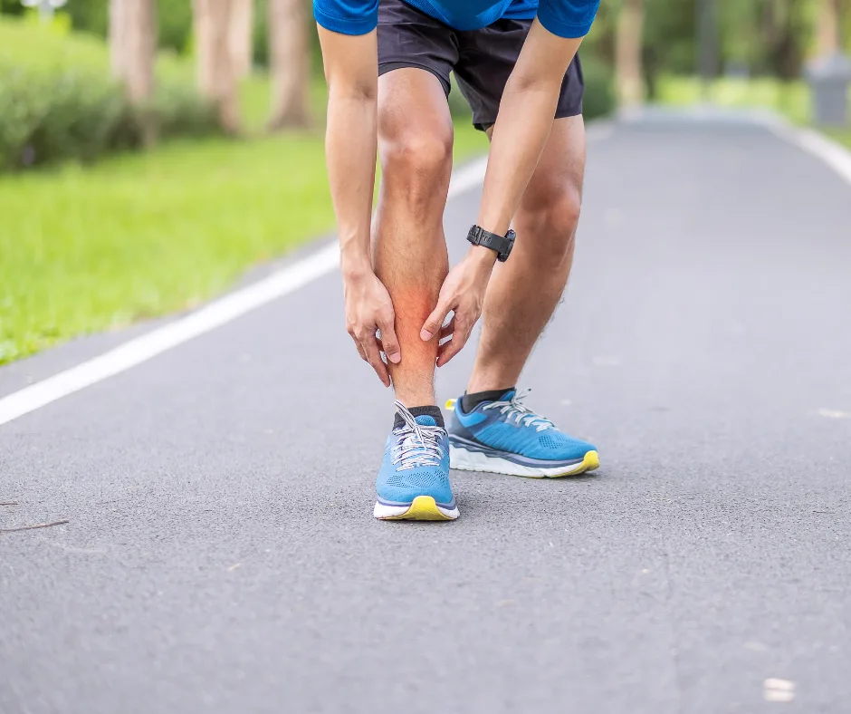 Source photograph: Runner gripping the shin